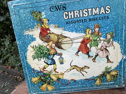 CWS Children pulling the Christmas Yule Log Biscuit Tin c1950s