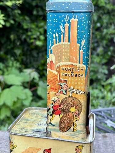Huntley & Palmers Christmas Elves Penny in the Slot Machine Biscuit Tin c1923
