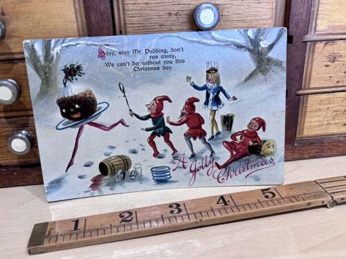 Anthropomorphic Christmas Pud Chased by Elves  Post Card Ephemera c1900s