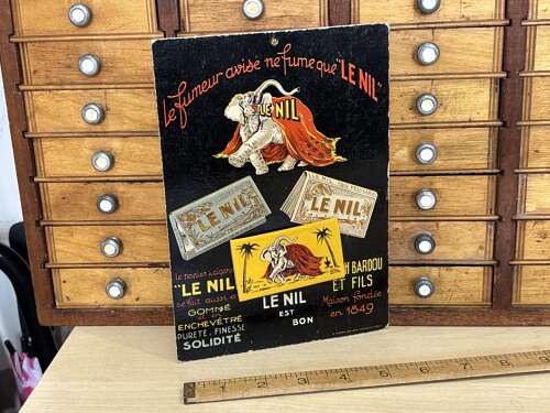 Le Nil Cigarette Papers Elephant image Advertising Card Sign c1920s